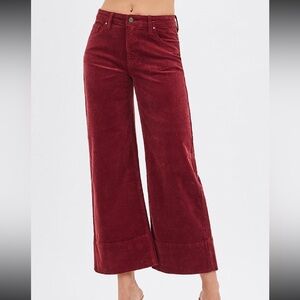 New with tags! Risen corduroy pants. Ankle length wide leg. Wine burgundy